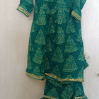 Make a style statement with our Beautiful Green Color Peplum Top and Garara Set, offering elegance and sophistication for festive occasions and parties.