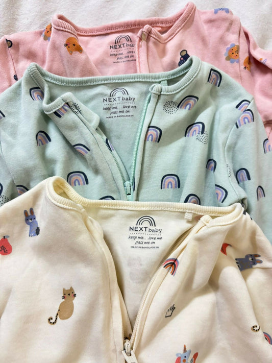 Buy NEXT Baby Sleep Suits – Pack of 3 super soft cotton onesies with 2-way zippers and built-in mitts for all-night comfort.

