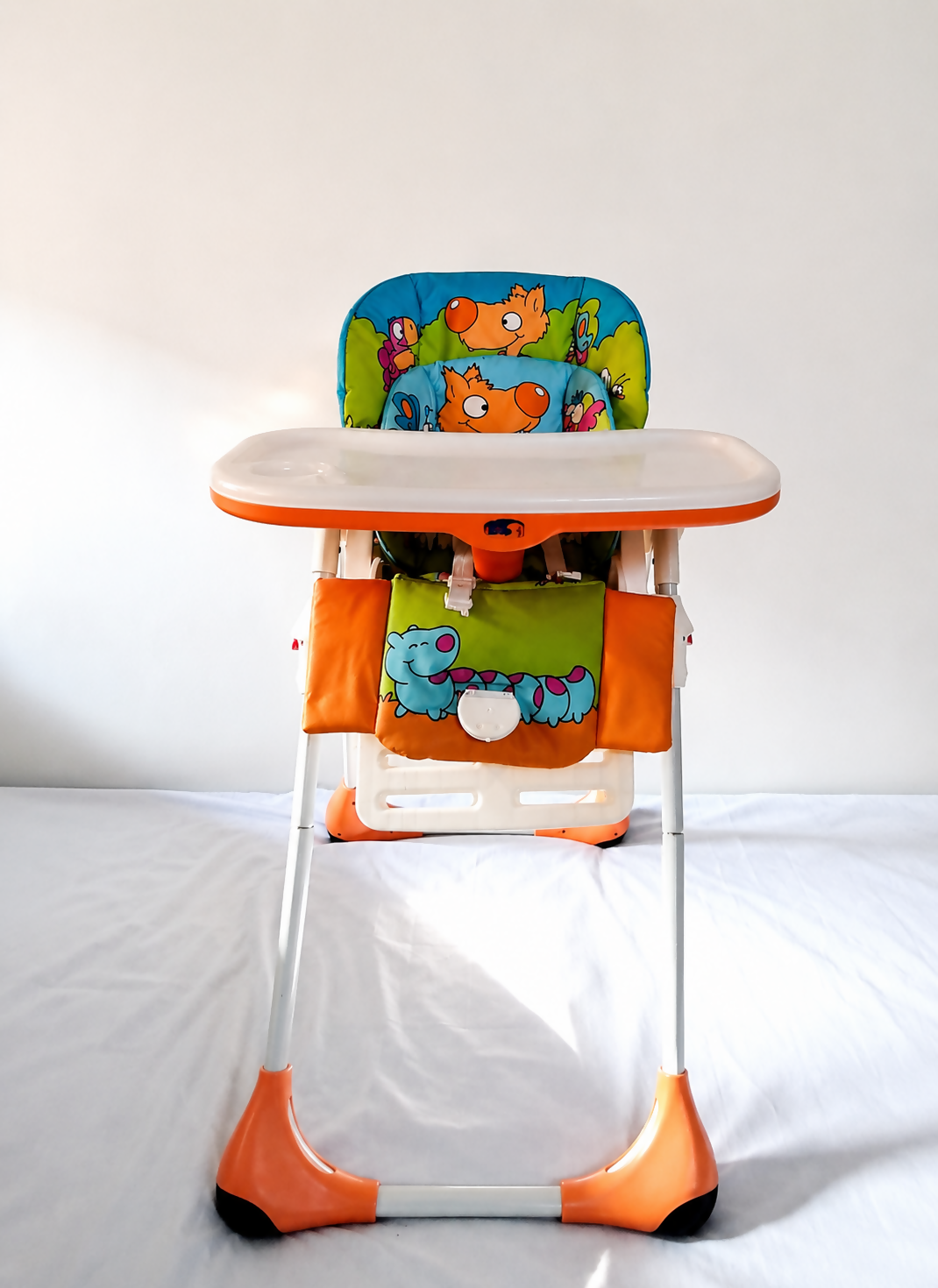 Chicco Polly foldable baby high chair with reclining feeding seat, adjustable tray, cushioned seating, sturdy frame, and premium design for comfortable baby mealtime and feeding.