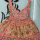 Floral patterned dress on a light blue background