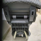 Child Car Seat with padded seating and safety harness for comfortable car travel.