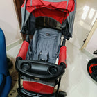 Chicco Cortina Baby Stroller with comfortable reclining seat, protective canopy, safety harness, smooth wheels, foldable frame, and spacious storage basket for convenient everyday outings with babies and toddlers.