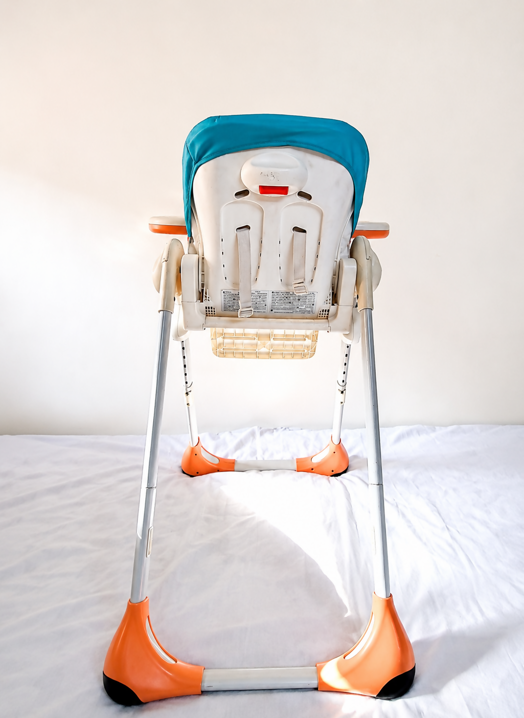 Chicco Polly foldable baby high chair with reclining feeding seat, adjustable tray, cushioned seating, sturdy frame, and premium design for comfortable baby mealtime and feeding.