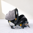 CHICCO KeyFit 30 Infant Car Seat B135 in Almost New condition featuring a rear-facing design, stay-in-car base, padded infant seating, secure harness, and convenient design for everyday car travel with babies. 