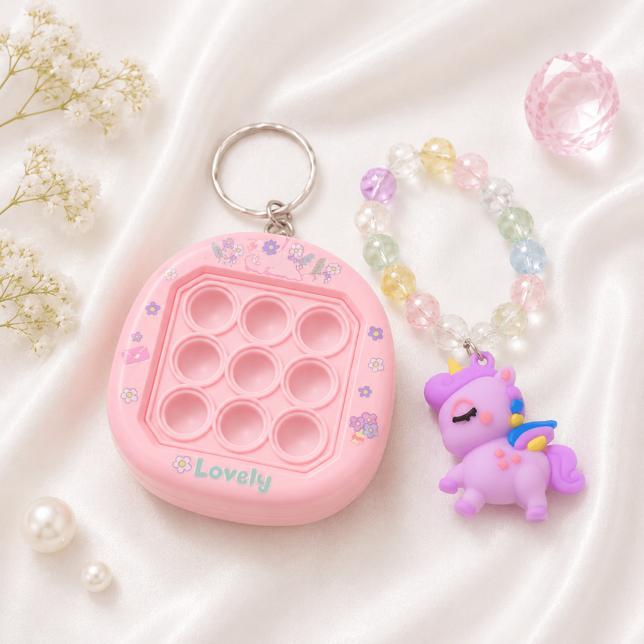 iLearnngrow Pop It Rakhi Combo featuring a colorful fidget-style Pop It Rakhi and festive gift elements, designed as a fun and playful Raksha Bandhan gift for kids.