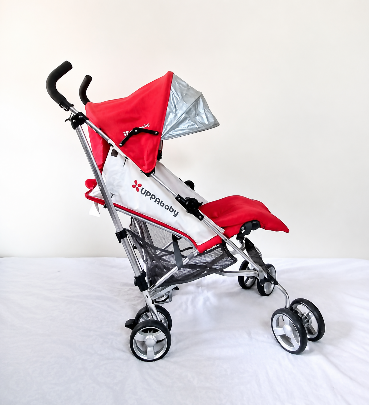 UPPAbaby Lightweight Umbrella Stroller with reclining seat, foldable compact design, adjustable canopy, safety harness, smooth wheels, and storage basket for comfortable everyday travel with babies and toddlers.