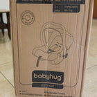 Babyhug Amber Car Seat Cum Carry Cot with padded seating, secure safety harness, ergonomic carry handle, protective canopy, and versatile design for comfortable travel with newborns and infants.