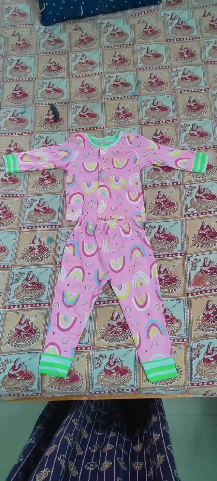 Cozy Rainbow Baby Pajama Set made from soft breathable fabric, featuring a colorful rainbow print, comfortable fit, elastic waistband, and gentle material for all-day comfort and restful sleep.