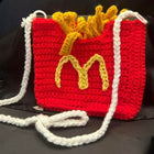 Handmade crochet bag for girls crafted from soft, durable yarn with a stylish design, comfortable strap, and lightweight construction for everyday use, outings, and special occasions.