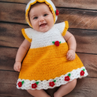 Handmade Crochet Baby Frock with delicate crochet detailing for baby girls.