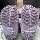 Pink Crocs for Kids in size C5 / 5.1 inches, featuring a lightweight, comfortable and easy-to-wear clog design with ventilation holes for everyday casual wear, playtime and outings.