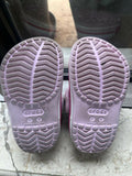 Pink Crocs for Kids in size C5 / 5.1 inches, featuring a lightweight, comfortable and easy-to-wear clog design with ventilation holes for everyday casual wear, playtime and outings.