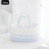 Baby diaper caddy bag with multiple storage compartments, cute design, organized sections, sturdy handles, and convenient storage for diapers, wipes, bottles, and baby essentials.