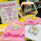 Personalised Newborn Baby Hamper with cute baby essentials and customised details.