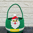 Green basket with Santa Claus face design 