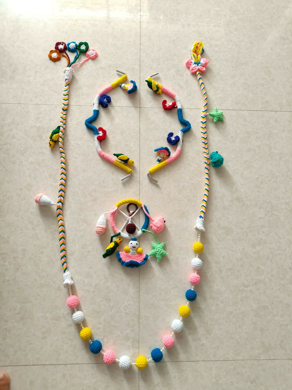 Colorful baby toys on a tiled floor