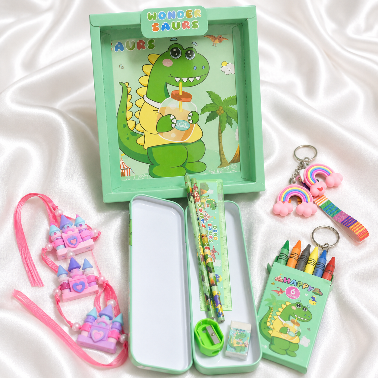 iLearnNGrow Dino Theme Stationery Rakhi Combo featuring a fun dinosaur pencil box set with a matching Dino Rakhi, combining useful stationery and festive fun for kids this Raksha Bandhan.