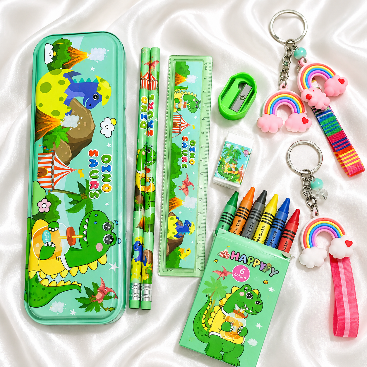 iLearnNGrow Dino Theme Stationery Rakhi Combo featuring a fun dinosaur pencil box set with a matching Dino Rakhi, combining useful stationery and festive fun for kids this Raksha Bandhan.