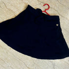 Blue skirt for girls, comfortable and stylish, ideal for casual and special occasions, with an adjustable elastic waistband.
