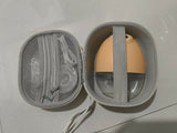 Bump2Cradle Wearable Hands-Free Breast Pump with travel case, featuring a hands-free wearable design, adjustable suction levels, rechargeable battery, quiet operation, and BPA-free components. Like new, barely used.