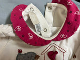 Keep your baby snug during mild chilly days with this soft cotton top and bottom set. 