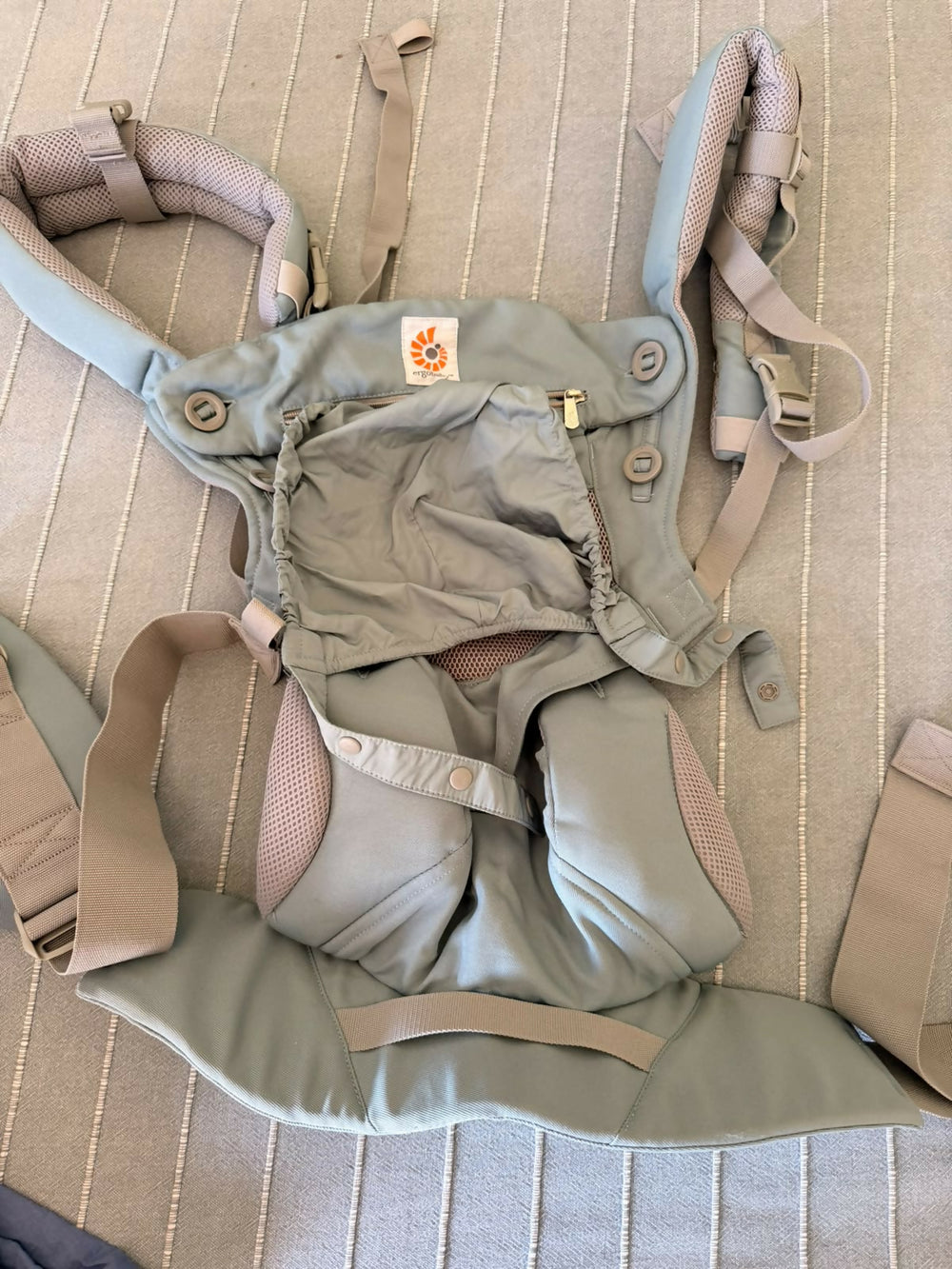 ERGOBABY Omni 360 Cool Air Mesh Baby Carrier with breathable fabric and four carrying positions