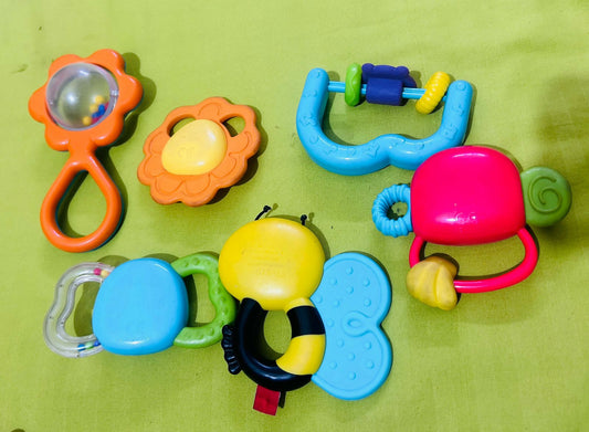 Engage and soothe your baby with the FISHER PRICE Rattle and Teether Set, featuring safe, colorful, and sensory-stimulating designs.