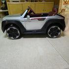 Kids Electric Ride-On Car for fun driving adventures and outdoor playtime.