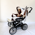 Emmaljunga City Cross Premium Stroller B128 in Almost New condition, available in Chennai, Tamil Nadu, featuring a reversible seat, comfortable reclining design, protective canopy, rain cover, sturdy frame, and smooth wheels.