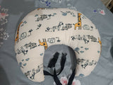 TOYTORIA feeding pillow and nursing pillow with soft cushioned support, ergonomic design, comfortable positioning, and breastfeeding support for mothers and babies.