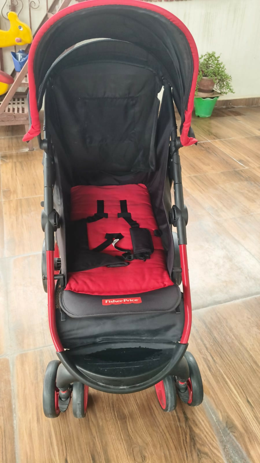 FISHER PRICE Baby Stroller/Pram in Almost New condition featuring comfortable seating, protective canopy, safety harness, smooth wheels, and a practical design for everyday walks, shopping, travel, and outings with your baby.