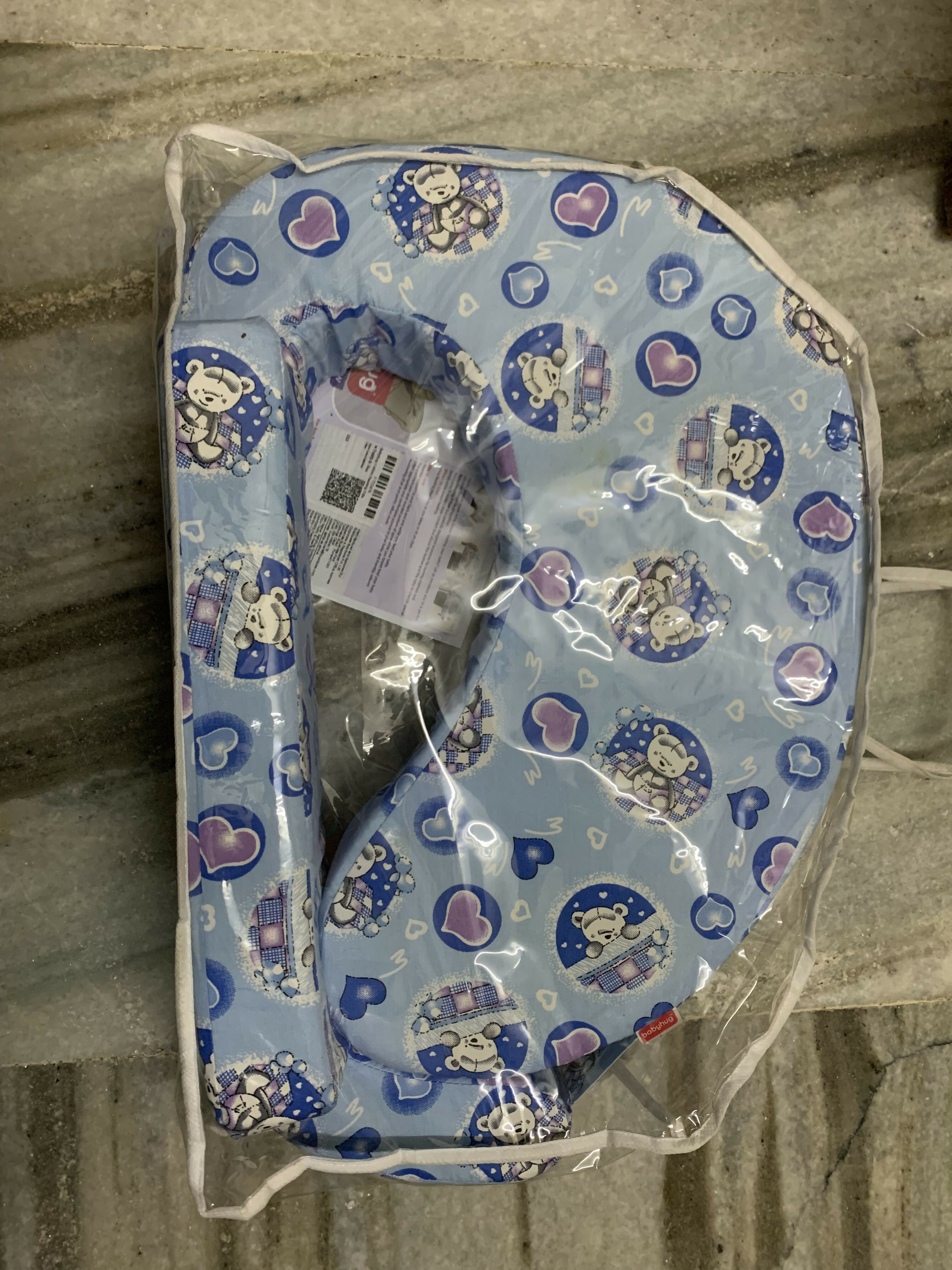 Feeding Pillow featuring soft cushioning and a supportive curved design to help provide a comfortable positioning setup during everyday breastfeeding, bottle feeding and nursing sessions.