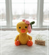 Crochet duck with flower