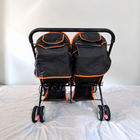 MEE MEE Twin Baby Stroller/Double Pram in Orange, Some Used condition, featuring two seats, reclining design, protective canopies and a foldable frame for convenient outings with twins or two young children.
