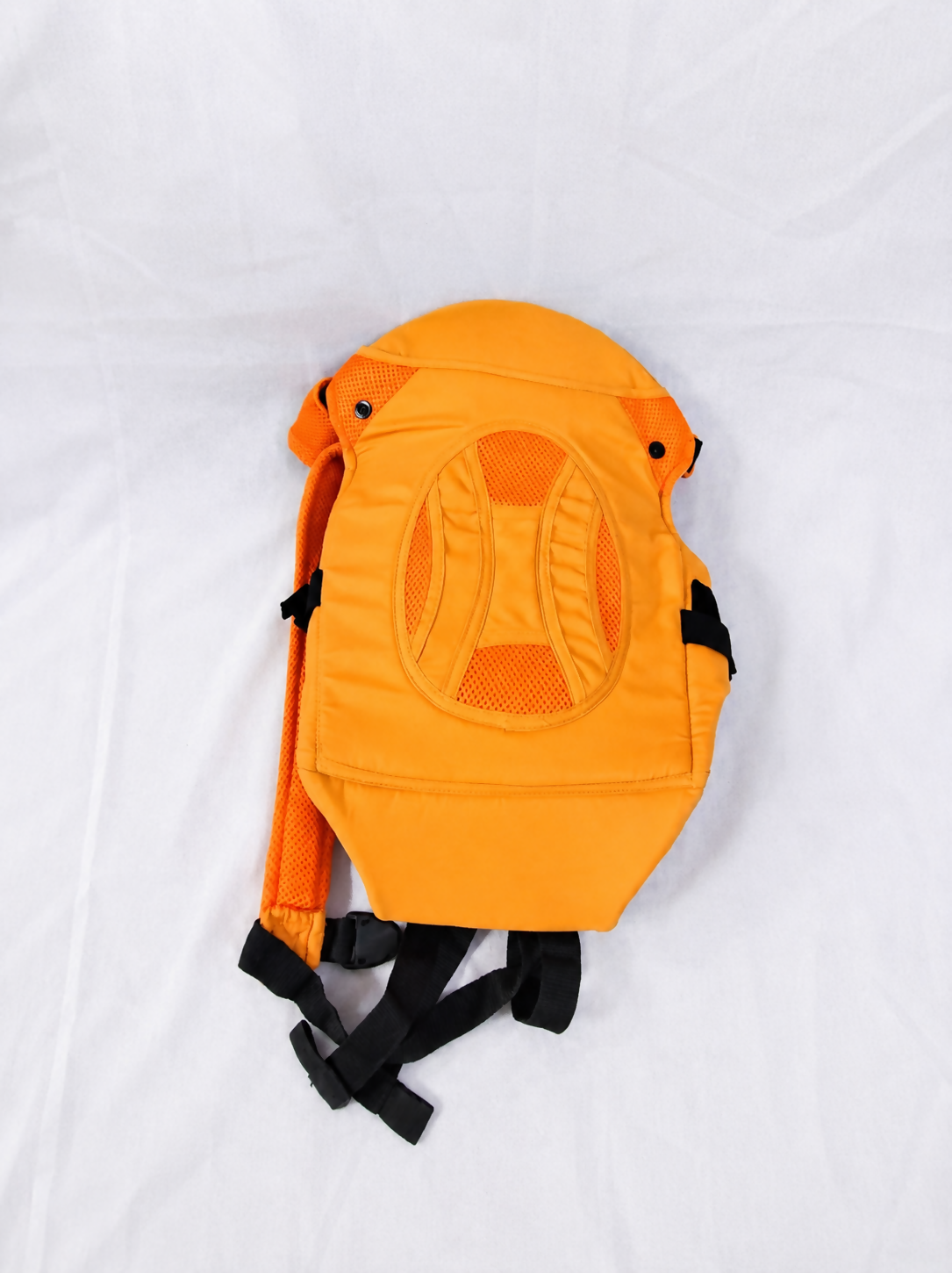 4-in-1 Ergonomic Baby Carrier in Orange with adjustable straps, breathable fabric, padded shoulder support, and multiple carrying positions for comfortable and secure babywearing.