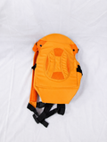 4-in-1 Ergonomic Baby Carrier in Orange with adjustable straps, breathable fabric, padded shoulder support, and multiple carrying positions for comfortable and secure babywearing.