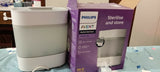 PHILIPS Avent Feeding Bottle Sterilizer: Kills 99.9% germs in 10 minutes with natural steam, stays sterile for 24 hours.