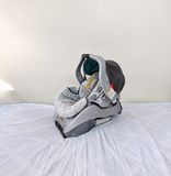 GRACO SnugRide SafeSeat Infant Car Seat B174 with rear-facing design and detachable base.