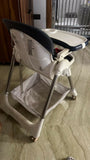 STAR AND DAISY Galaxy Star High Chair with comfortable padded seat, adjustable feeding tray, safety harness, sturdy frame, footrest, and easy-clean design for convenient baby and toddler mealtimes.