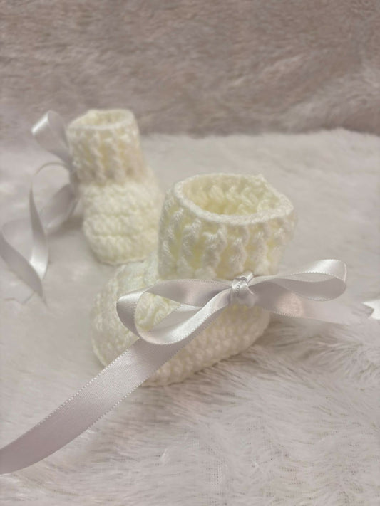 Handcrafted love for tiny toes.
