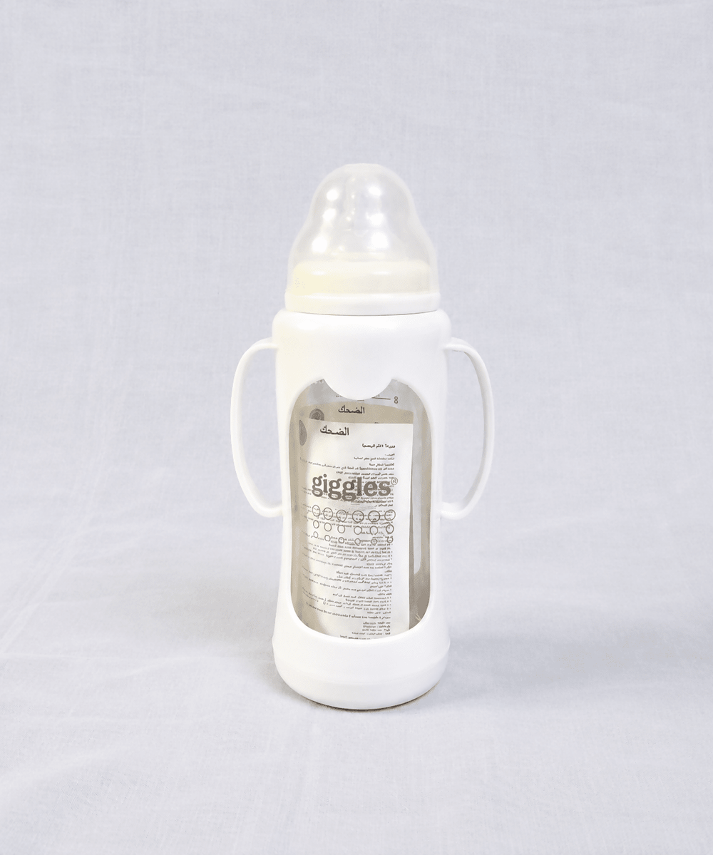 Giggles 210ml Glass Feeding Bottle with dual handles, BPA-free glass, soft silicone nipple, and ergonomic design for comfortable, safe, and easy feeding for babies learning to hold a bottle.