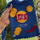 Handmade crochet bag for girls crafted from soft, durable yarn with a stylish design, comfortable strap, and lightweight construction for everyday use, outings, and special occasions.
