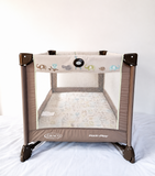 Graco Pack 'N Play Baby Playard Portable Travel Cot B138 in Some Used condition featuring foldable design, breathable mesh sides, animal print, and a spacious enclosed area for supervised play and rest.