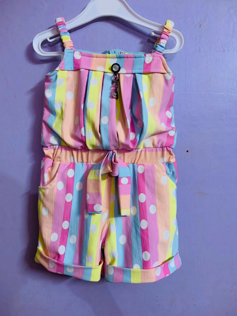 Explore style and comfort with our New Jumpsuit with Tag – crafted from soft fabric and featuring charming designs for your baby girl's everyday adventures.