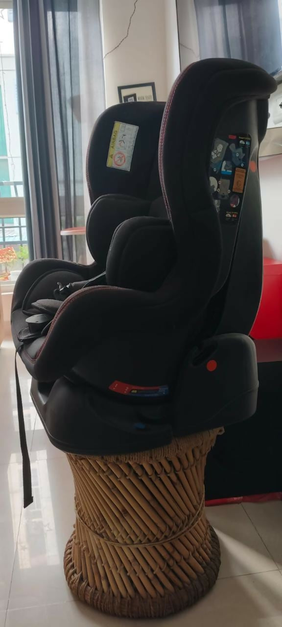 The LUVLAP Convertible Car Seat in classic black is designed to grow with your child, offering a versatile solution for safe and comfortable travel. 