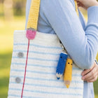 Handmade crochet bag for girls crafted from soft, durable yarn with a stylish design, comfortable strap, and lightweight construction for everyday use, outings, and special occasions.