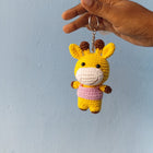 Handmade Crochet Animal Keychains crafted from soft yarn with adorable animal designs, detailed hand-stitched finishes, lightweight construction, and sturdy key rings for bags, keys, and gifting.