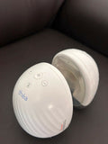 Théa wearable electric breast pump with hands-free design, compact milk collection cups, adjustable suction, and portable pumping support for breastfeeding mothers.