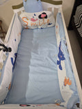 HUNYHUNY 15 in 1 Baby Crib/Rocker in Almost New condition featuring a versatile convertible design, rocking function, protective side rails and spacious sleeping area designed to adapt to different stages of your child’s growth.
