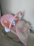 INFANTSO baby rocker and bouncer in pink with cushioned seating, gentle rocking motion, secure safety harness, and comfortable support for baby relaxation, play, and rest.
